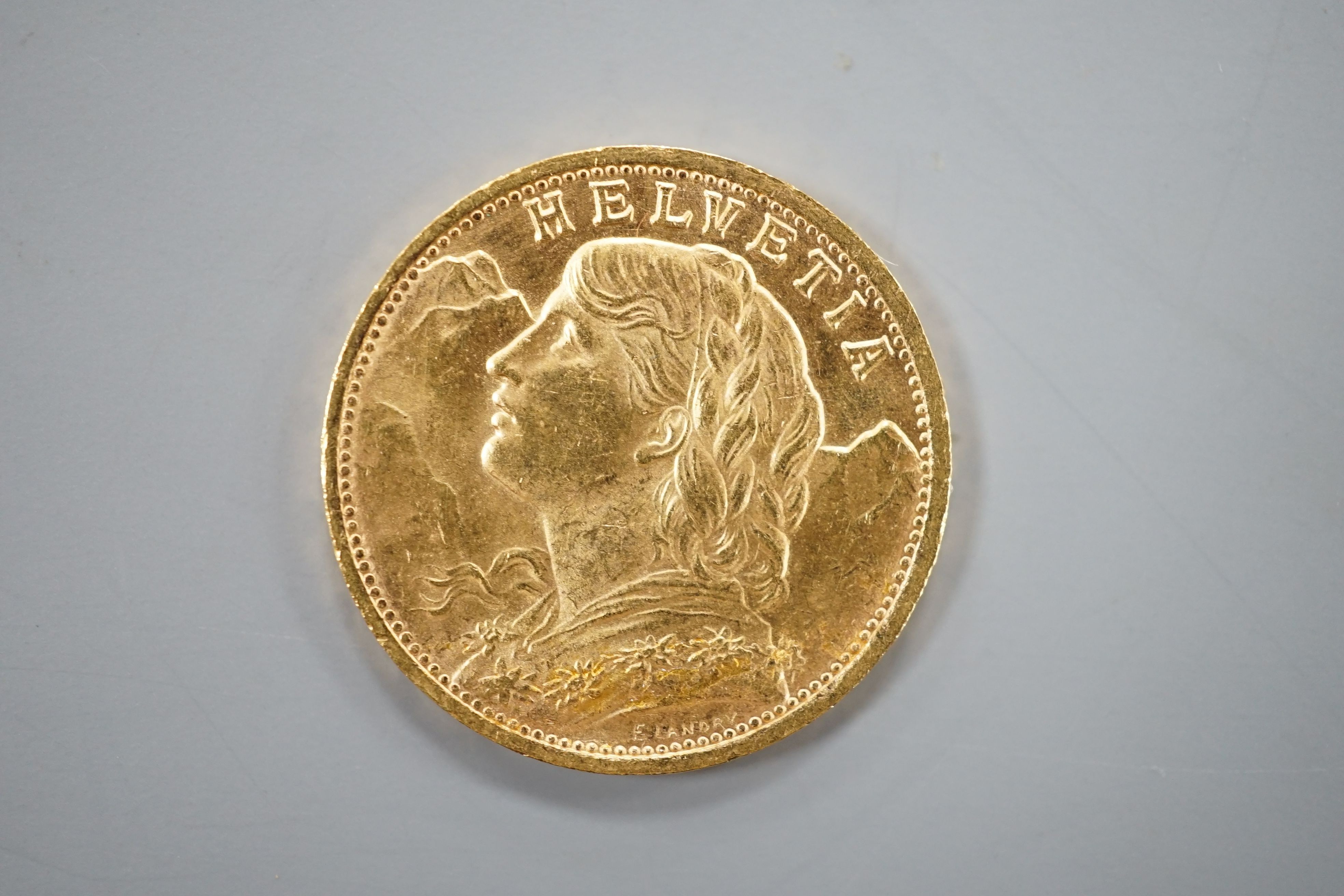 A Swiss 1935 gold 20 francs coin, 6.6 grams